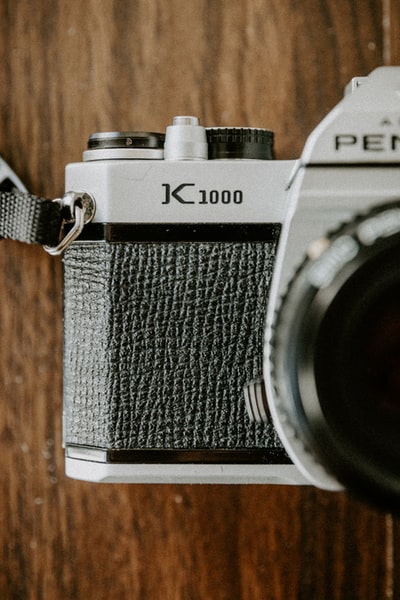 black and silver pentax camera